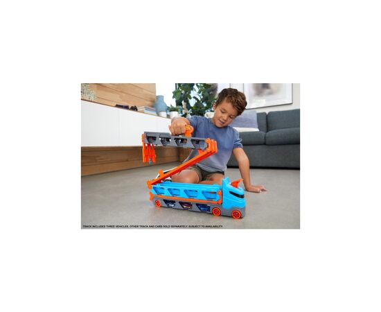 Игровой набор Hot Wheels Грузовик-транспортер "Супергонки" (GVG37), изображение 7 Игровой набор Hot Wheels Грузовик-транспортер "Супергонки" (GVG37), изображение 7