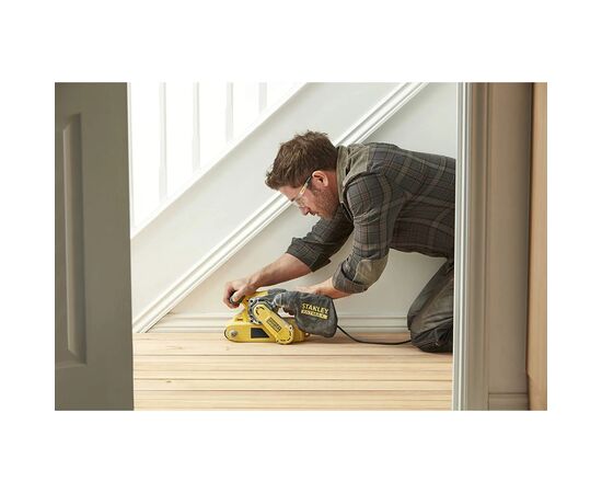 Шлифовальная машина Stanley FatMax, 1010W, размер ленты 533х76 мм, 3.5 кг (FMEW204K), изображение 7 Шлифовальная машина Stanley FatMax, 1010W, размер ленты 533х76 мм, 3.5 кг (FMEW204K), изображение 7