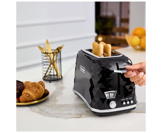 Тостер DeLonghi CTJ2103.BK, изображение 7 Тостер DeLonghi CTJ2103.BK, изображение 7