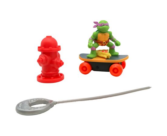 Игровой набор Funrise TMNT Черепашки-ниндзя классические Скейтбордист с лаунчером Донателло (71042), изображение 9 Игровой набор Funrise TMNT Черепашки-ниндзя классические Скейтбордист с лаунчером Донателло (71042), изображение 9