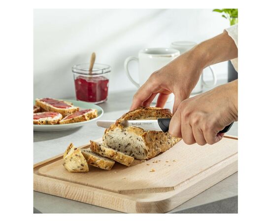 Кухонный нож Tefal ColorFood зубчастий 10 см Чорний (K2731304), изображение 2 Кухонный нож Tefal ColorFood зубчастий 10 см Чорний (K2731304), изображение 2