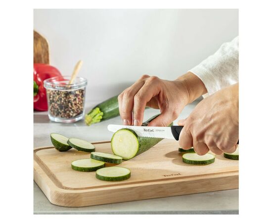 Кухонный нож Tefal ColorFood зубчастий 10 см Чорний (K2731304), изображение 3 Кухонный нож Tefal ColorFood зубчастий 10 см Чорний (K2731304), изображение 3