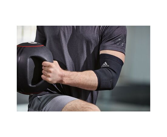 Фиксатор локтя Adidas Performance Elbow Support ADSU-13331 Чорний S (885652007603), изображение 6 Фиксатор локтя Adidas Performance Elbow Support ADSU-13331 Чорний S (885652007603), изображение 6