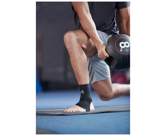 Фиксатор голеностопа Adidas Performance Ankle Support ADSU-13314 Чорний XL (885652007559), изображение 2 Фиксатор голеностопа Adidas Performance Ankle Support ADSU-13314 Чорний XL (885652007559), изображение 2