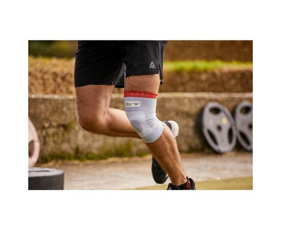 Фіксатор коліна Reebok Speedwick Knee Support білий, червоний RRSU-14324 M (885652015912), зображення 6 Фіксатор коліна Reebok Speedwick Knee Support білий, червоний RRSU-14324 M (885652015912), зображення 6