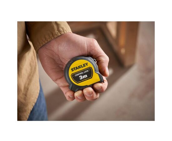 Рулетка Stanley CONTROL-LOCK, 3мх19мм, у прогумованому корпусі, з двосторонньою шкалою (STHT37230-0), зображення 12 Рулетка Stanley CONTROL-LOCK, 3мх19мм, у прогумованому корпусі, з двосторонньою шкалою (STHT37230-0), зображення 12