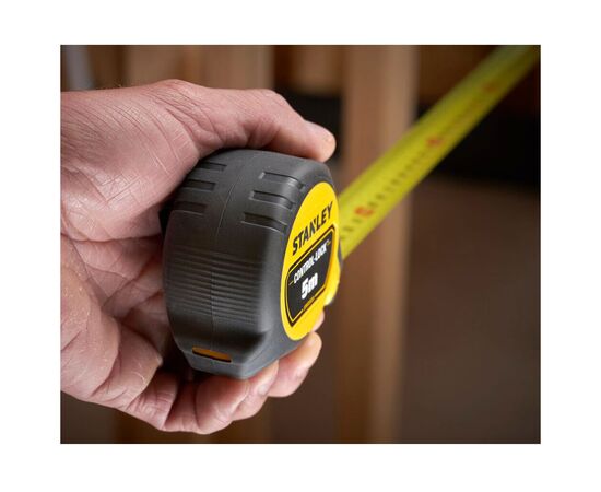 Рулетка Stanley CONTROL-LOCK, 5мх25мм, у прогумованому корпусі, з двосторонньою шкалою (STHT37231-0), зображення 8 Рулетка Stanley CONTROL-LOCK, 5мх25мм, у прогумованому корпусі, з двосторонньою шкалою (STHT37231-0), зображення 8