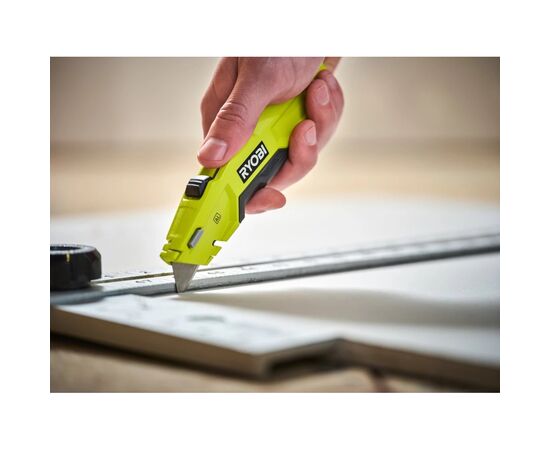 Нож монтажный Ryobi RHCKF-1, трапециевидное лезвие, корпус алюминий (5132006401), изображение 2 Нож монтажный Ryobi RHCKF-1, трапециевидное лезвие, корпус алюминий (5132006401), изображение 2