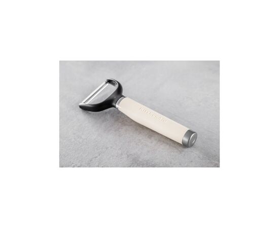 Овощечистка KitchenAid Coreline, горизонтальна 18,8 см, кремовий (KAG145OHACE), изображение 5 Овощечистка KitchenAid Coreline, горизонтальна 18,8 см, кремовий (KAG145OHACE), изображение 5