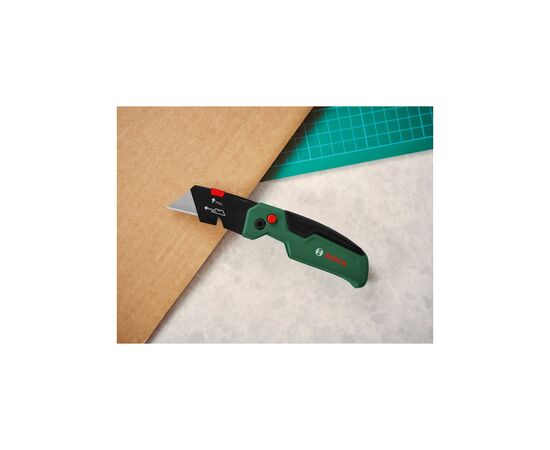 Нож монтажный Bosch трапециевидный складной, корпус пластик, 144мм (1.600.A02.75M), изображение 2 Нож монтажный Bosch трапециевидный складной, корпус пластик, 144мм (1.600.A02.75M), изображение 2