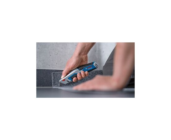 Нож монтажный Bosch строительный трапециевидный складной, корпус пластик, 253мм (1.600.A01.V3H), изображение 2 Нож монтажный Bosch строительный трапециевидный складной, корпус пластик, 253мм (1.600.A01.V3H), изображение 2