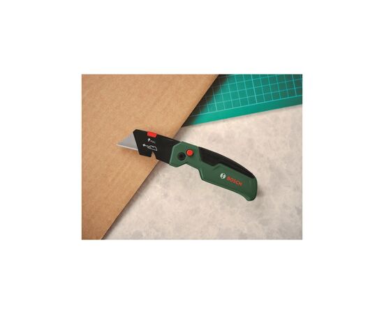 Нож монтажный Bosch строительный трапециевидный, корпус двухкомпонентный, 175x40x25мм (1.600.A03.2V7), изображение 2 Нож монтажный Bosch строительный трапециевидный, корпус двухкомпонентный, 175x40x25мм (1.600.A03.2V7), изображение 2