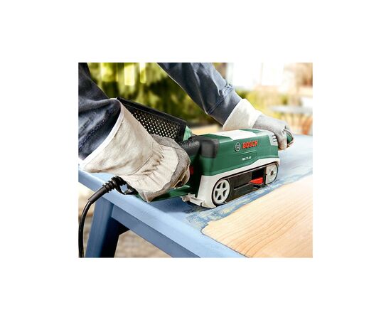 Шлифовальная машина Bosch ленточная PBS 75 A 710Вт, лента 533х75мм, 350м/мин 3.4кг (0.603.2A1.000), изображение 5 Шлифовальная машина Bosch ленточная PBS 75 A 710Вт, лента 533х75мм, 350м/мин 3.4кг (0.603.2A1.000), изображение 5