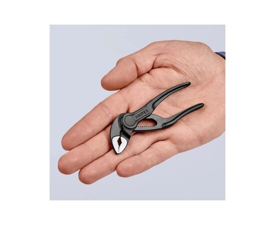 Клещи KNIPEX COBRA XS переставная 1" (28мм) (87 00 100 BK), изображение 6 Клещи KNIPEX COBRA XS переставная 1" (28мм) (87 00 100 BK), изображение 6