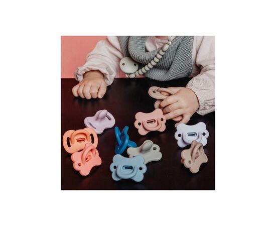 Пустышка Suavinex Colour Essence фізіологічна у формі метелика, 0-6 місяців, рожева (308911), изображение 4 Пустышка Suavinex Colour Essence фізіологічна у формі метелика, 0-6 місяців, рожева (308911), изображение 4